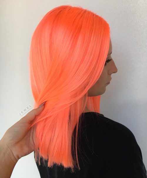 Noticeable Neon Peach Orange Hair Color