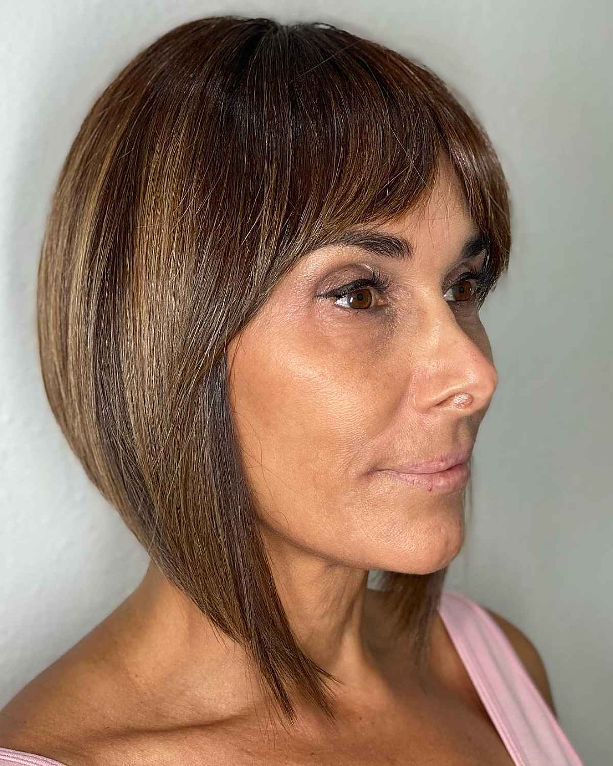 Short Layered Hair with Curtain Bangs for Women Over 40